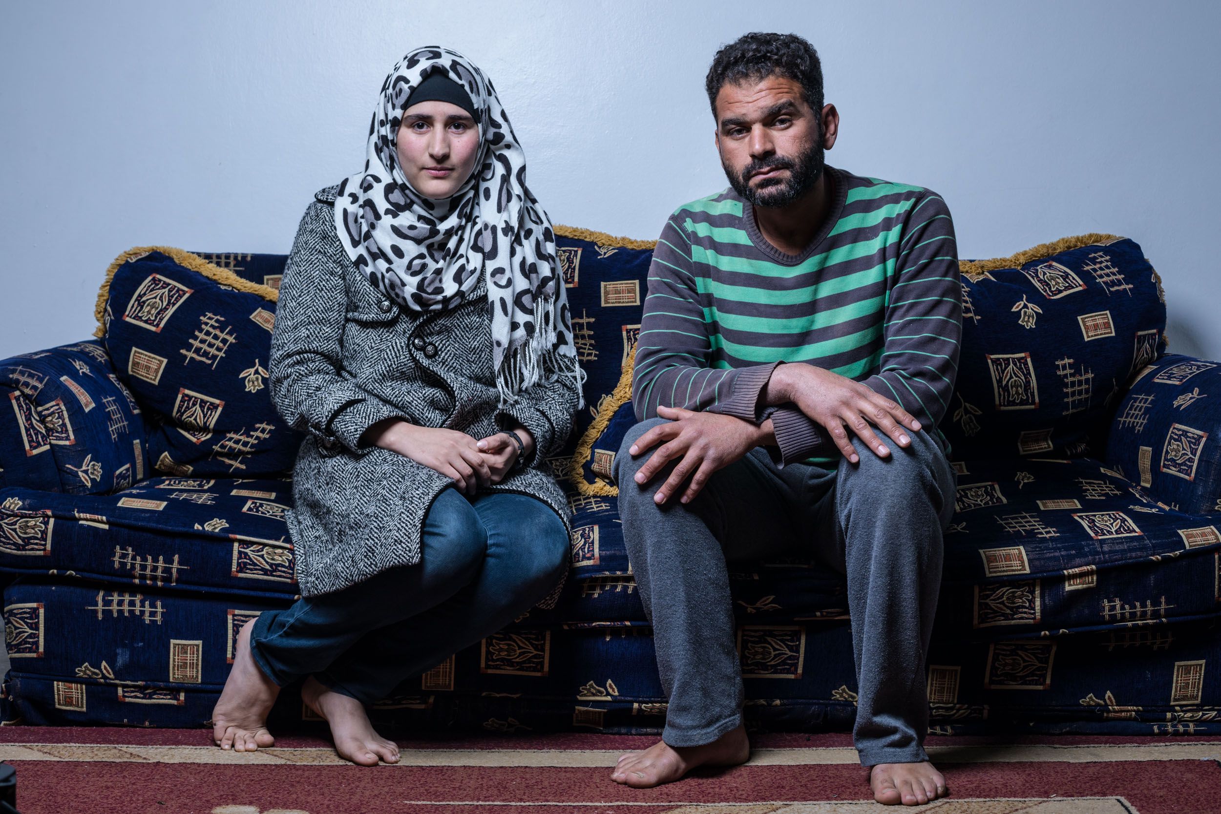 Layal, a Syrian child bride next to her violent and abusive husband. Portrayed in Irbid, Jordan. Photo by Martin Thaulow.