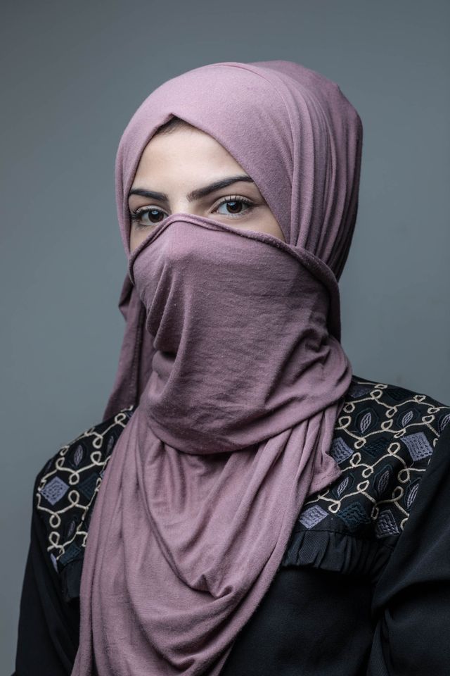 Portrait of a child bride in Amman, Jordan. Married off at the age of 13. Photo by Martin Thaulow.